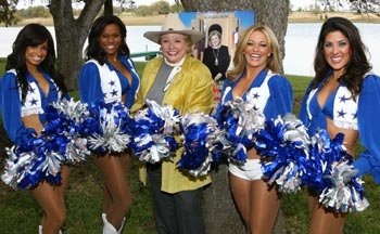 Barbara Taylor Bradford and the Cowboys Cheerleaders strike a pose with pompoms