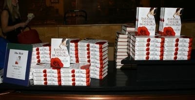 A stack of Barbara Taylor Bradford's novel, The Heir, awaits the guests of the gala event at the Dallas Women's Museum