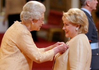 Barbara Taylor Bradford with Her Majesty Queen Elizabeth II