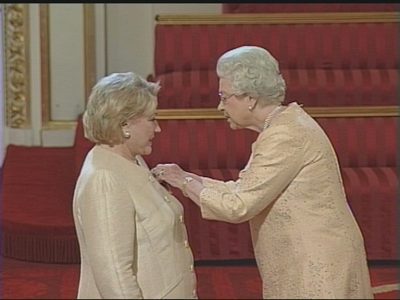 BTB Gets Her OBE From QEII